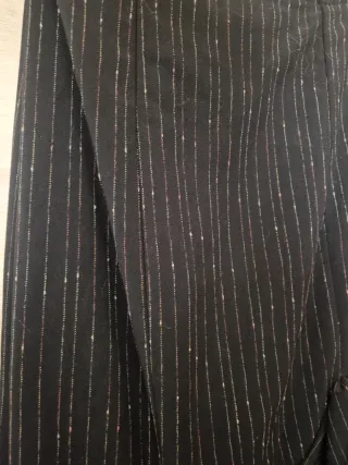 Traje de flamenca negro con volantes