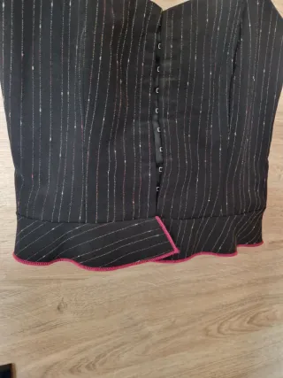 Traje de flamenca negro con volantes