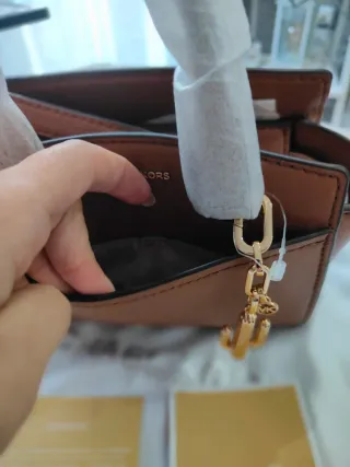 Borsetta Michael Kors con portafoglio