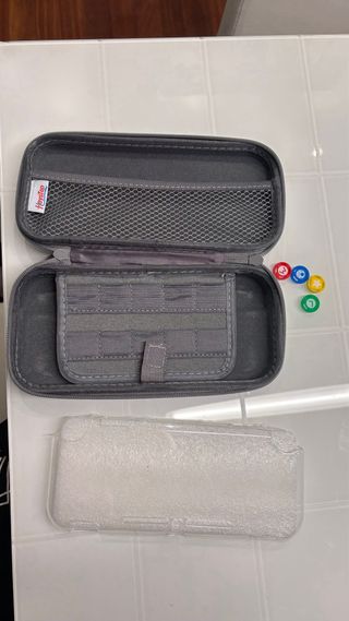 Nintendo Switch Lite Grigia con vinile lilla + Custodia