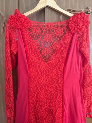 Traje de flamenca rojo y rosa