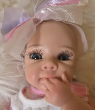 Bebé Reborn Silicona Completa con moisés y cuna