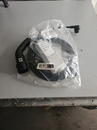 Juego de mangueras cargador coche eléctrico.