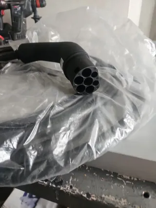 Juego de mangueras cargador coche eléctrico.