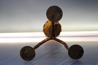 Candelabro antiguo artesanal, forja. Preciosa pátina dorada.