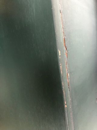 Mueble restaurado verde y multicolor