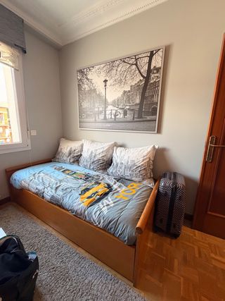 Cama nido de madera y tela