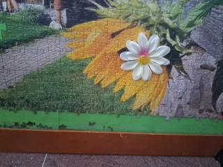 Puzzle casa y girasoles a medio hacer