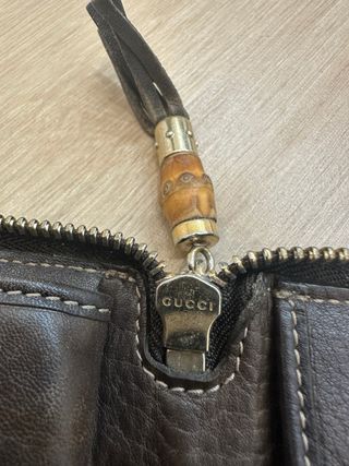 Portafoglio Gucci monogram beige e marrone