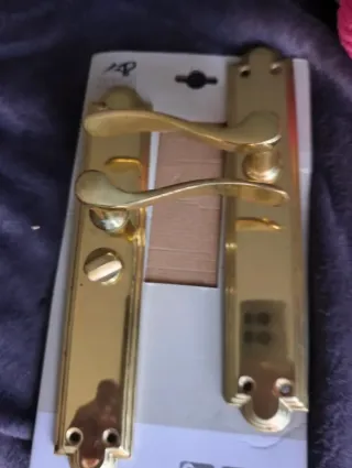 2 Manillas Puerta Pestillo Doradas.