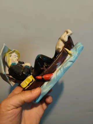 Figura porcelana pescador con paraguas