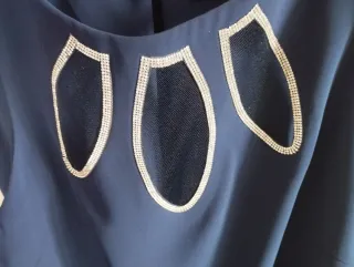 Eva Garavaldi Tunica Asimmetrica con pantalone