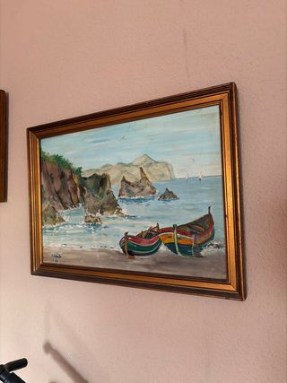 Cuadro de barcos en la playa