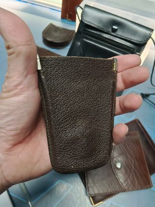 Lote de carteras y monederos y correas y bolsos de piel vintage