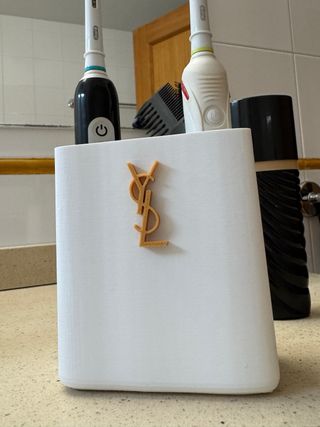 Caixa utilitária YSL dourada e branca