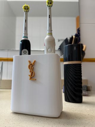 Caixa utilitária YSL dourada e branca