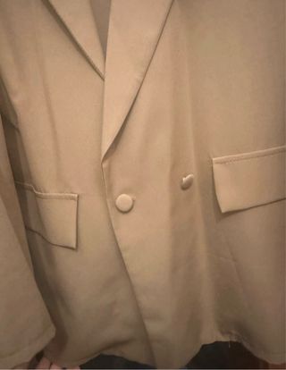 Conjunto blazer e calças castanhas