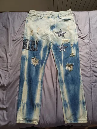 Jeans strappati con stelle taglia 30
