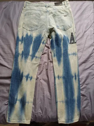 Jeans strappati con stelle taglia 30