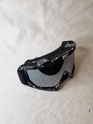 Gafas de esquí negras con puntos blancos