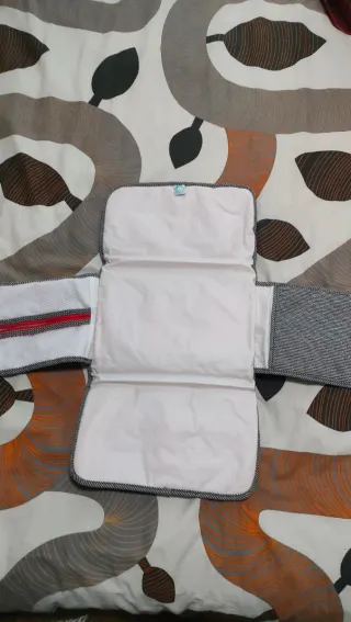 Guantes, cambiador y colchoneta Tuc Tuc