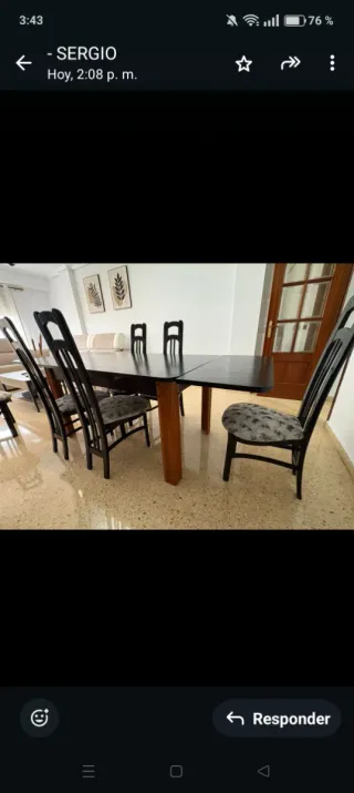 Mesa de comedor negra con 4 sillas