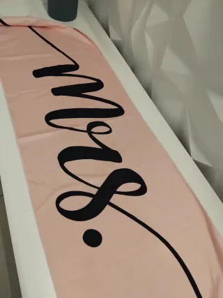 Sujetador deportivo, toalla y portamóvil