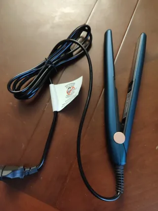 Plancha de pelo azul y dorada nueva estrenar