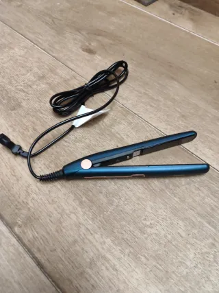 Plancha de pelo azul y dorada nueva estrenar