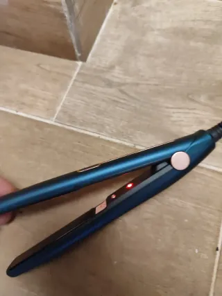 Plancha de pelo azul y dorada nueva estrenar