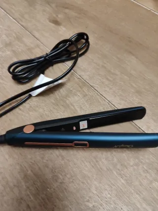 Plancha de pelo azul y dorada nueva estrenar