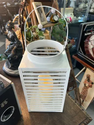 Faroles decorativos metálicos con vela