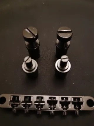 Puente guitarra Tune-o-matic negro.