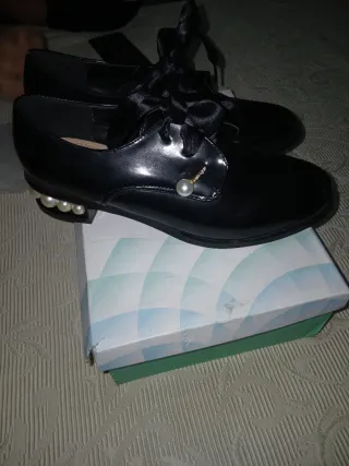 Mocassini neri con perle