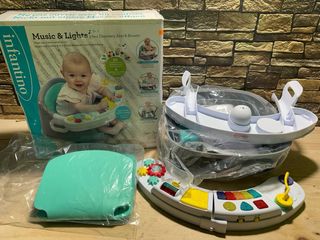 Infantino Asiento y elevador 3 en 1 Musica y Luces