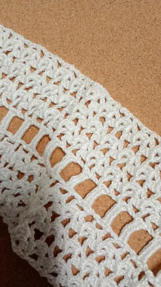 Colcha y piezas de ganchillo y encaje