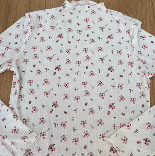 Body blanco flores manga larga