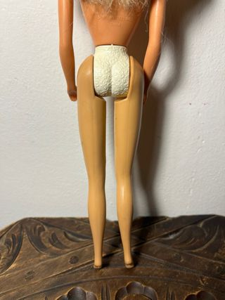 Barbie con orecchini rosa