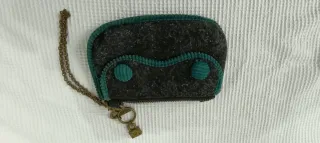 Pochette con catena e ciondoli