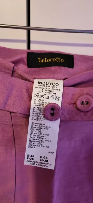 Conjunto Chaqueta y Falda rosa.