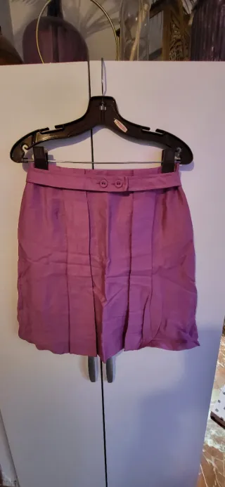 Conjunto Chaqueta y Falda rosa.