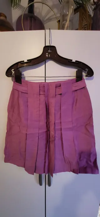 Conjunto Chaqueta y Falda rosa.