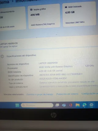 Ordenador portátil HP blanco.