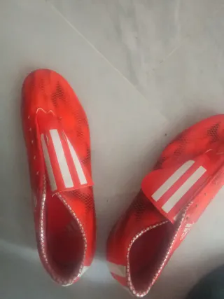 Botas de fútbol Adidas naranjas