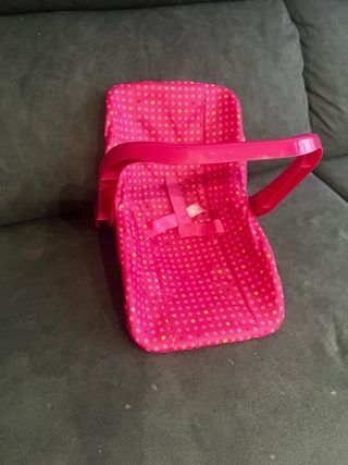 Trona de juguete rosa lunares