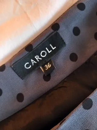 Falda Caroll gasa gris con lunares.