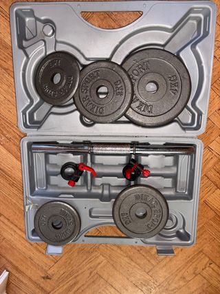 Caja de mancuernas con discos