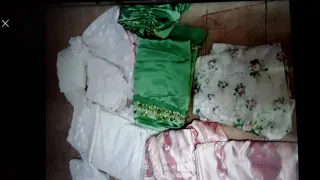 Cortinas verdes y blancas de tela