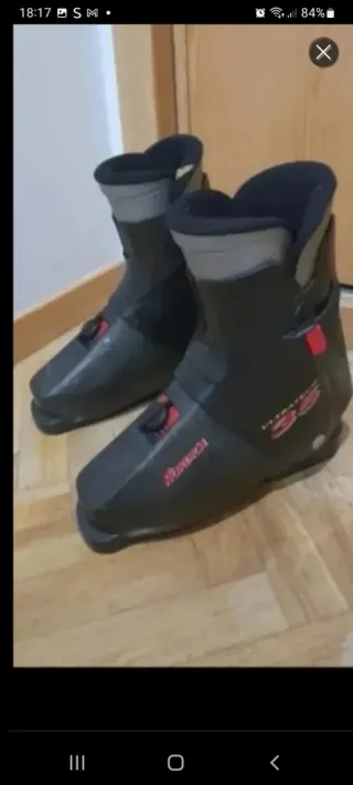 Conjunto de esquís y botas