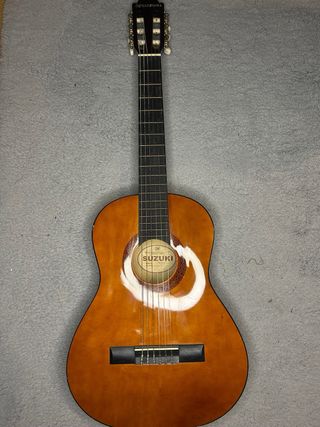 Guitarra Suzuki como nova